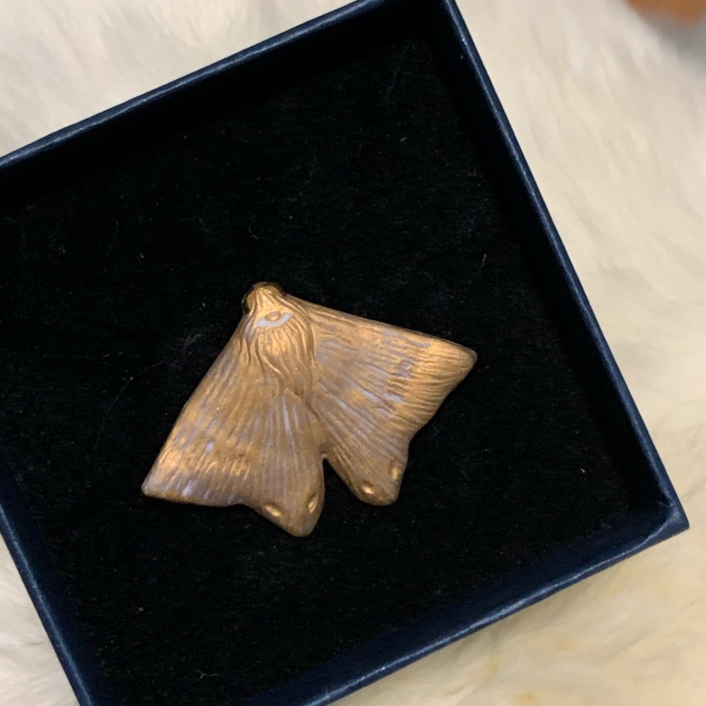 Golden moth brooch